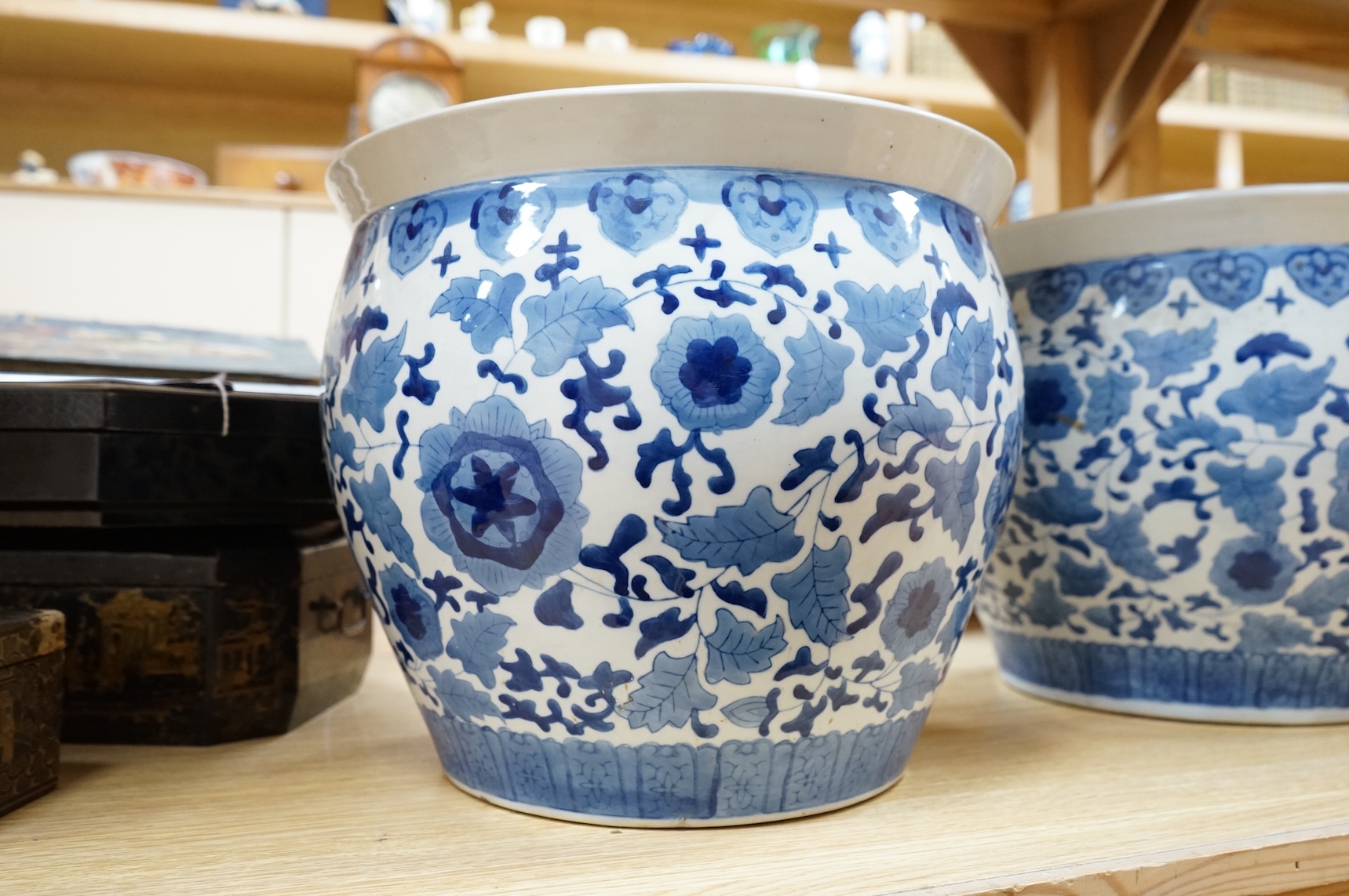 A pair of Chinese blue and white jardinieres, 30cm high